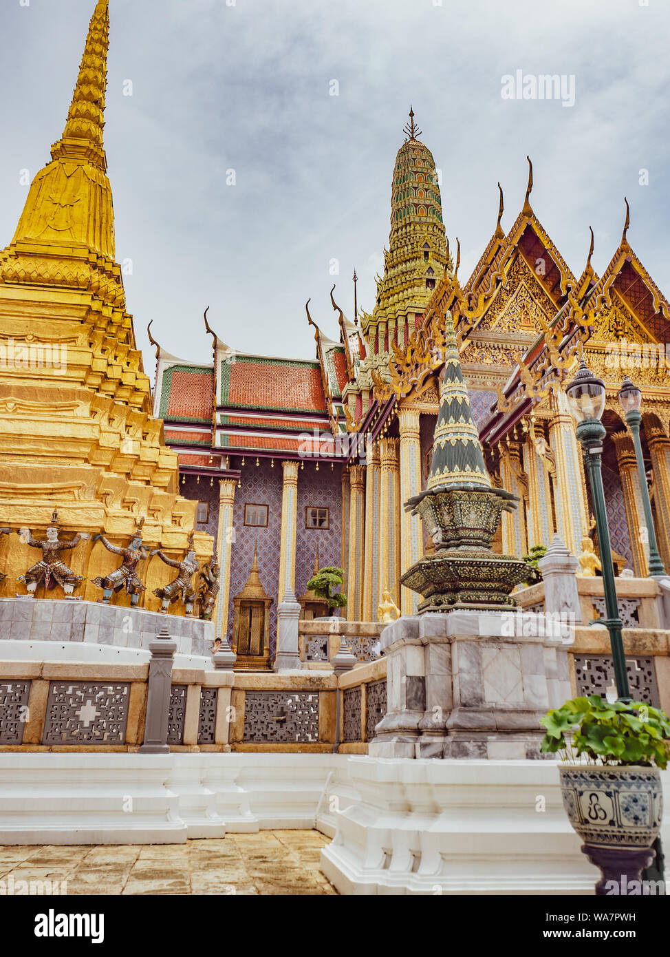 Golden decoration of Temple of Emerald Buddha, Wat Phra Kaew, Grand Royal Palace in Bangkok, Thailand. Official residence of the Kings of Siam. Stock Photo