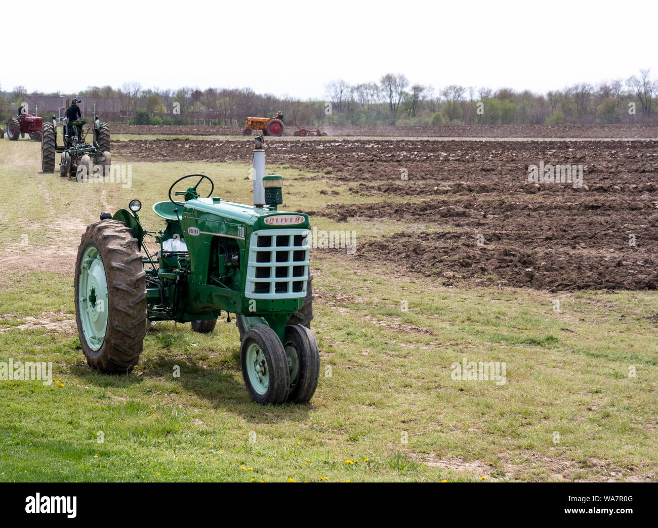 April 28 2018 Buchanan MI USA; tractors plow a field during the plow days event in Michigan Stock Photo