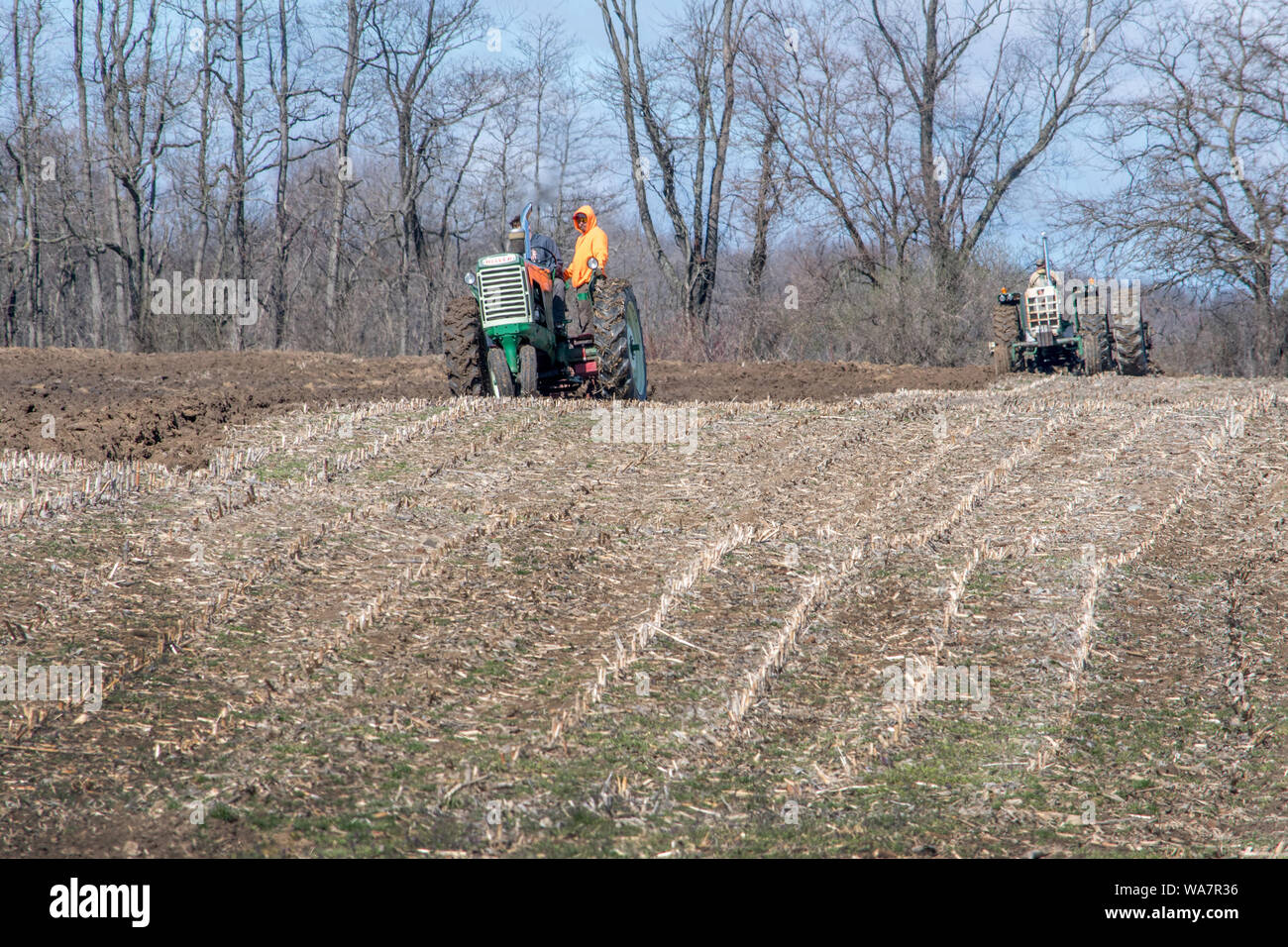 April 28 2018 Buchanan MI USA; farm teams work to plow a field during Plow days in this small Michigan USA town Stock Photo