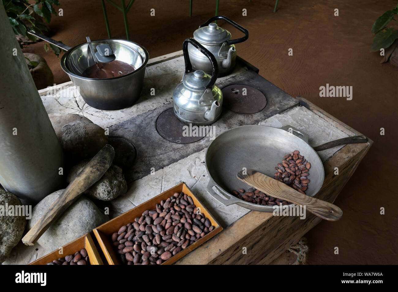 Roasting cacao seeds and making cocoa at a chocolate farm, Costa Rica Stock Photo