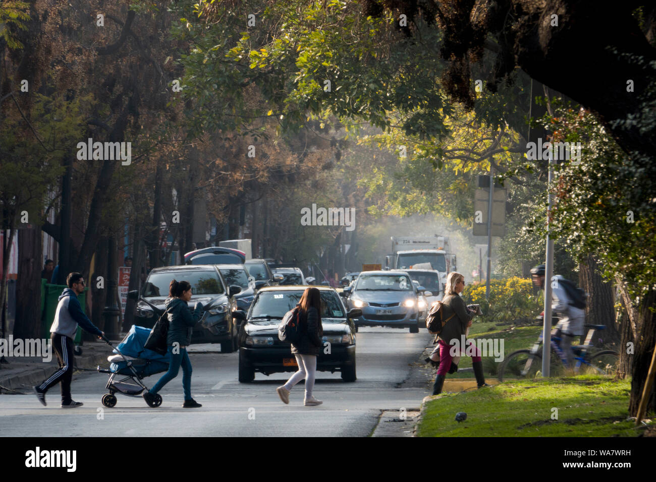 Pedestrians crossing the street in Barrio Yungay, Santiago, Chile Stock Photo