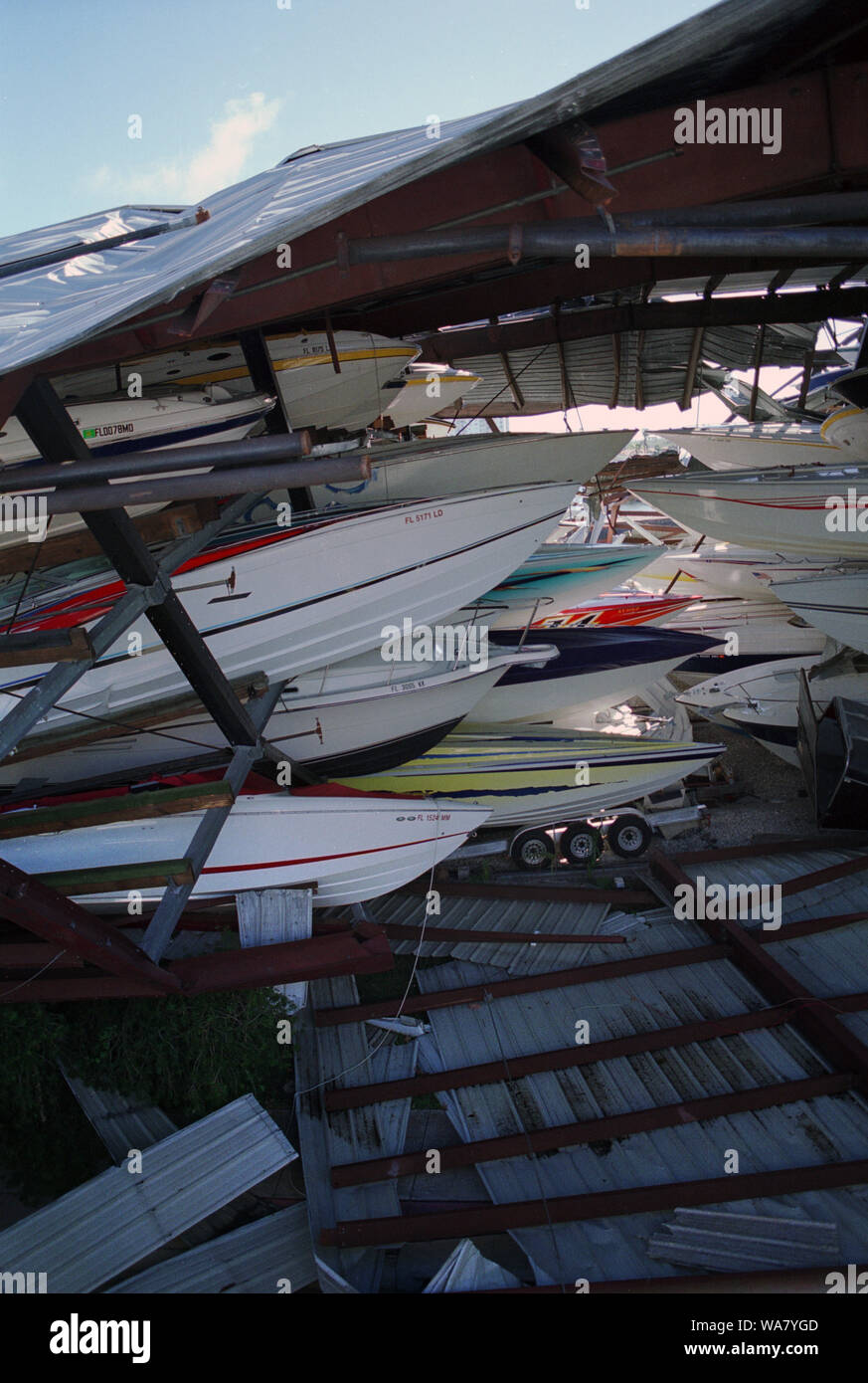 Hurricane damage of multilevel boat storage in Sunny Isles Beach (Miami, Florida, USA), collapsed destroying many boats and several vehicles parked inside during hurricane Wilma in October 2005 Stock Photo