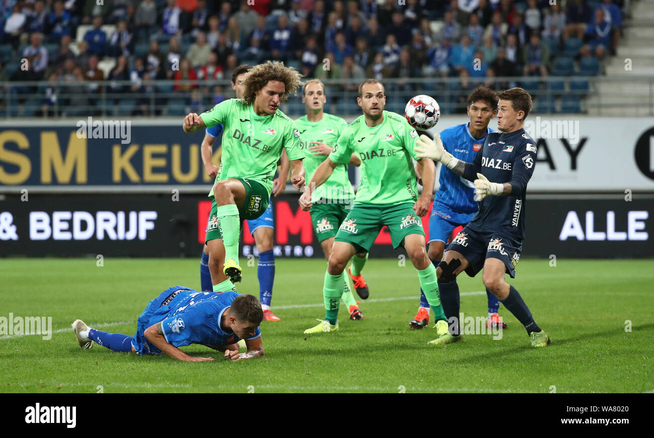 GENT, BELGIUM - AUGUST 18: Mikael Lustig of Kaa Gent battles for the ball with Wout Faes of Kv Oostende and William Dutoit of Kv Oostende during the Jupiler Pro League match day 4 between KAA Gent and KV Oostende on August 18, 2019 in Ghent, Belgium. (Pho Stock Photo