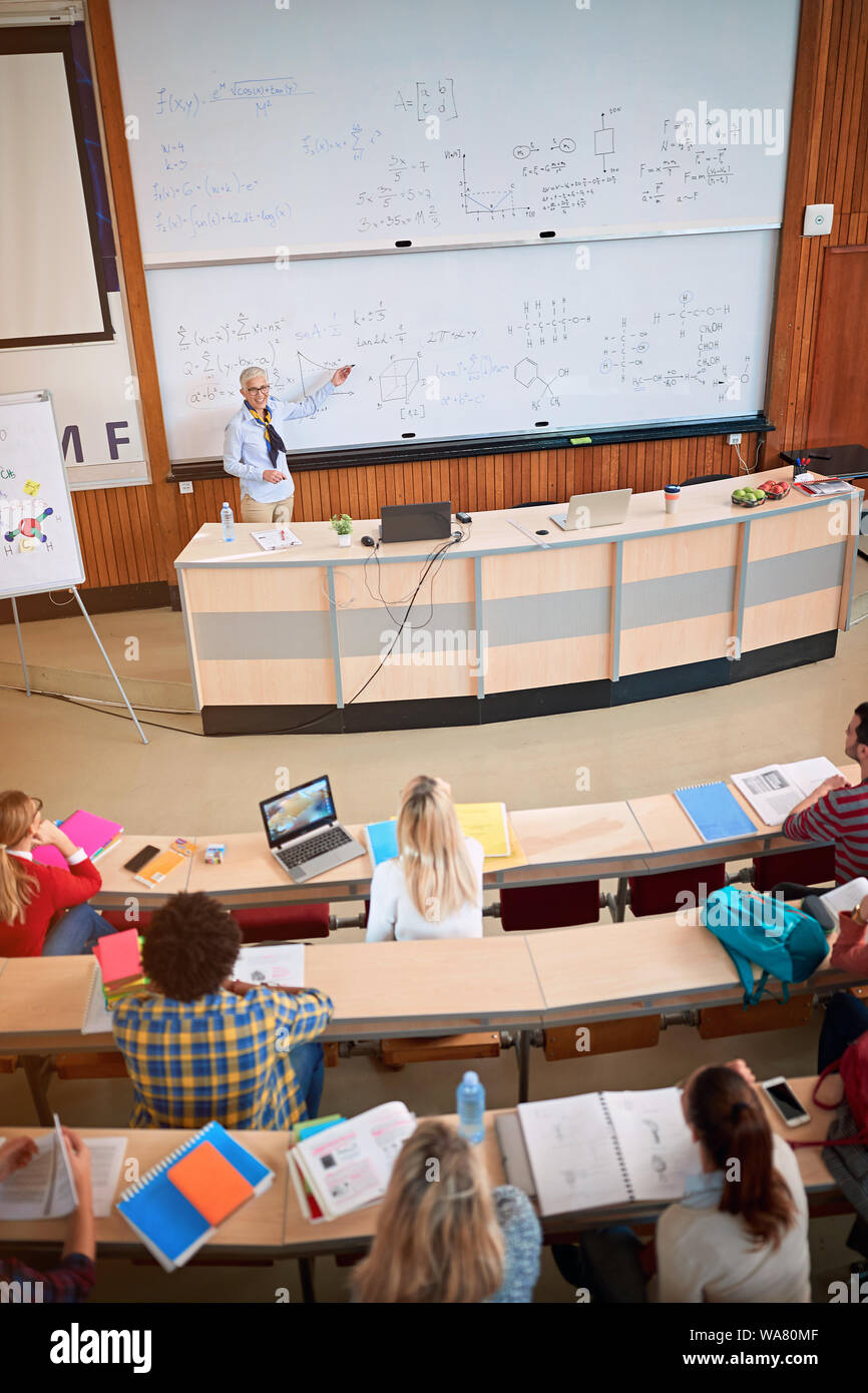 students in class learning - professor in training class with students Stock Photo