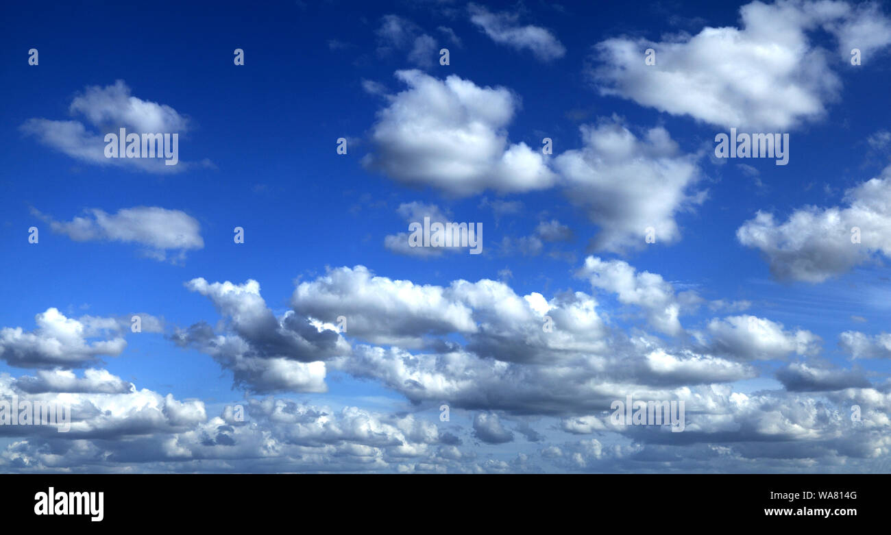 White, cumulus, clouds, blue sky Stock Photo