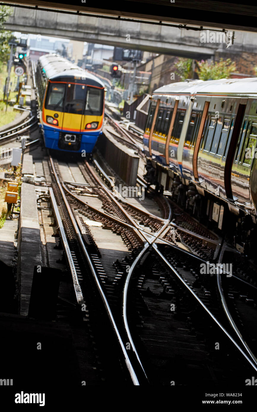 Train and tracks coming into North London station, England, United Kingdom, Europe Stock Photo