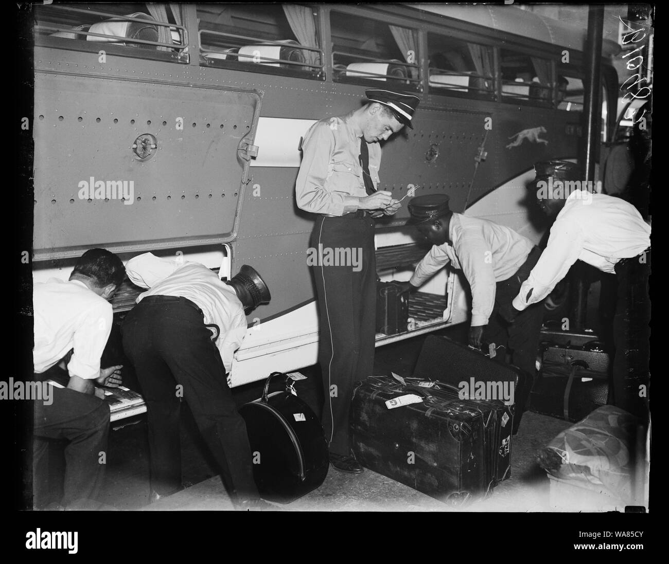 Bus transportation checking baggage Stock Photo Alamy