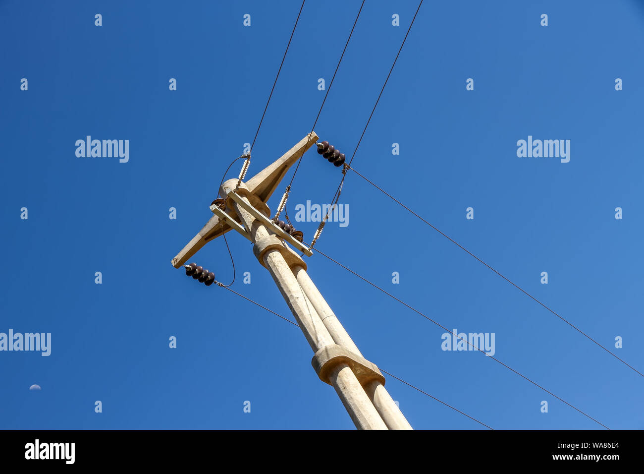 View on the electric wires on the pole on a sunny day Stock Photo - Alamy