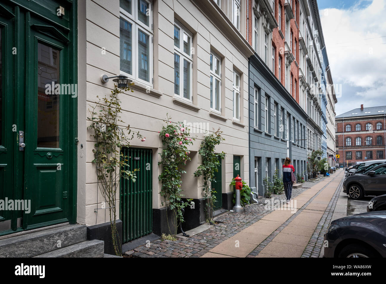 woman walking along a famous gallery street in Copenhagen, August 16, 2019 Stock Photo