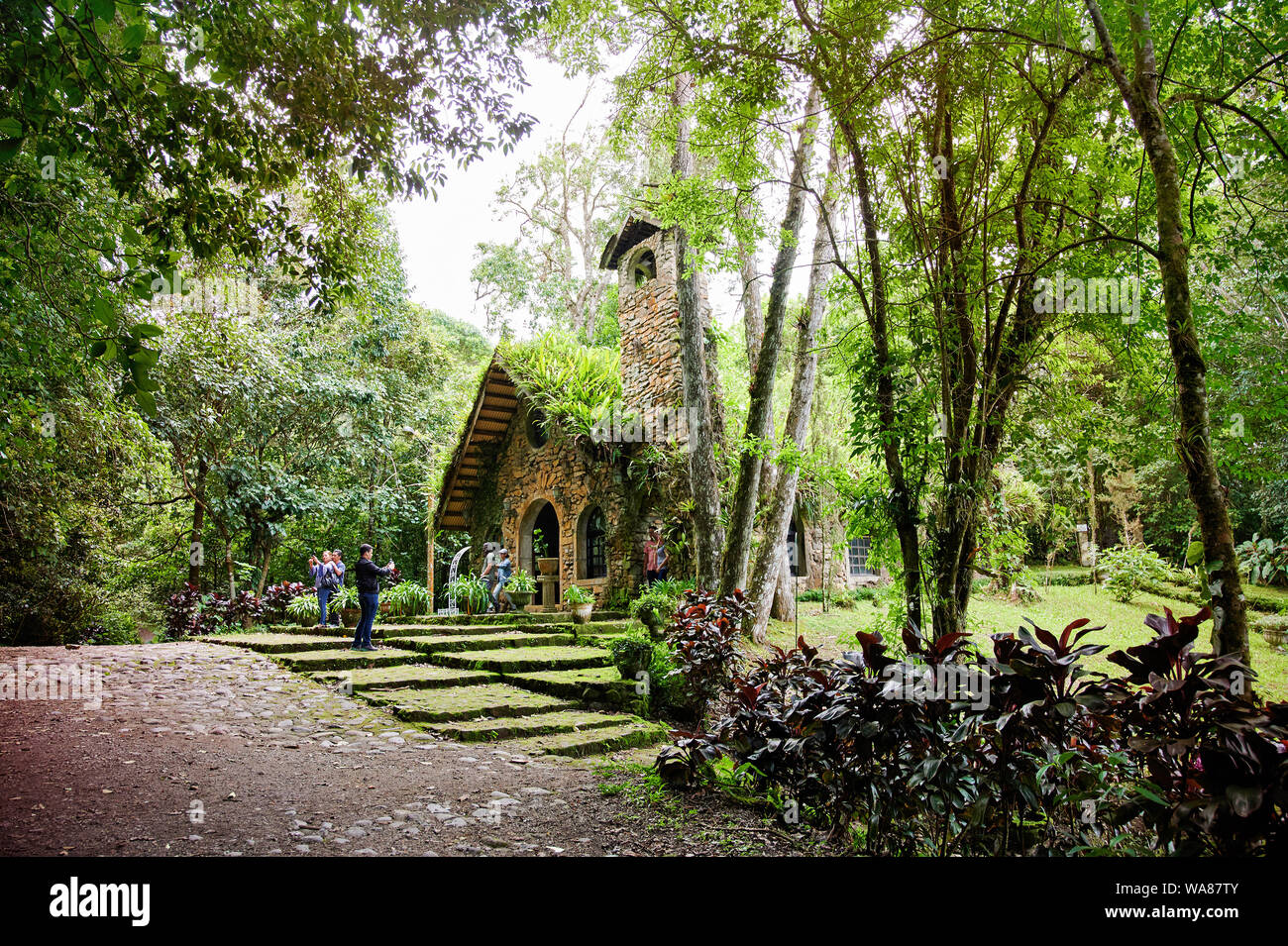 Matagalpa, Nicaragua - august  11, 2019: People walk next to church in ecolodge Selva Matagalpa Nicaragua Stock Photo