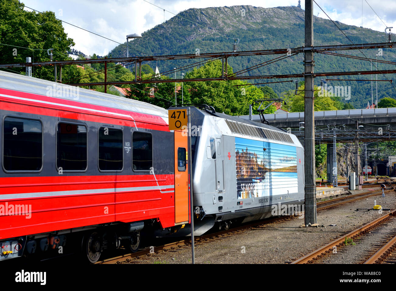 NSB Class EL 18 electric locomotive no. 22 arrives at Bergen Central Station at the rear of a service from Oslo. Stock Photo