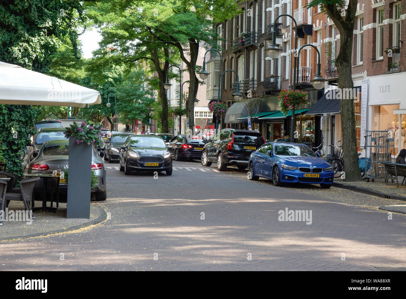 Cornelis Schuytstraat, Oud Zuid, Amsterdam, The Netherlands - home to a wide variety of cafés and restaurants, high-end boutiques and beauty stores. Stock Photo