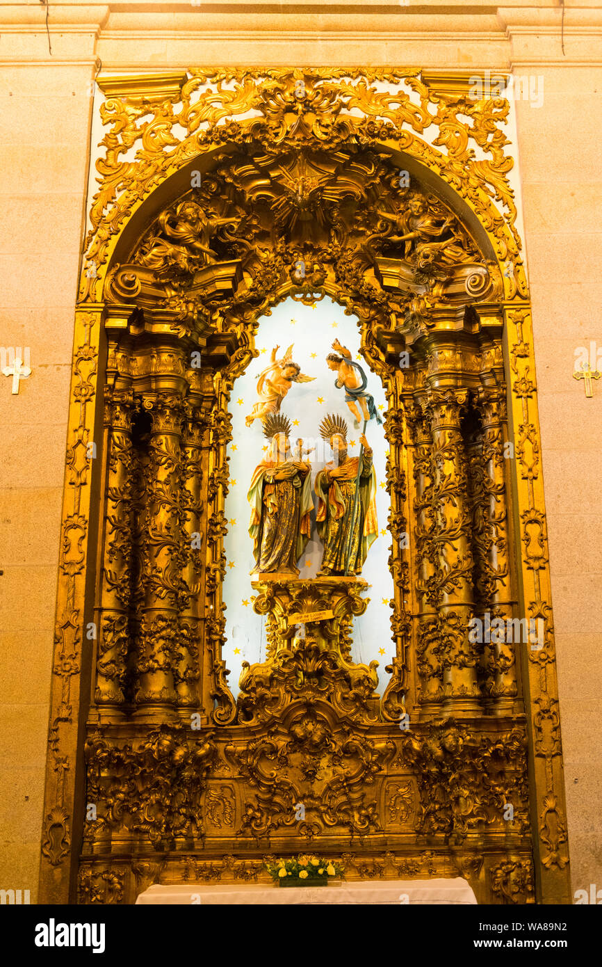 Portugal Oporto Porto Igreja do Carmo Church Baroque by Jose Figueiredo 1768 Rua do Carmo altar figures candles candlesticks gold gilt ornate columns Stock Photo