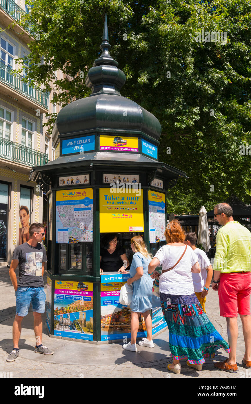 Portugal Oporto Porto Yellow Bus tour tourist office queue tourists sightseeing tours tree trees