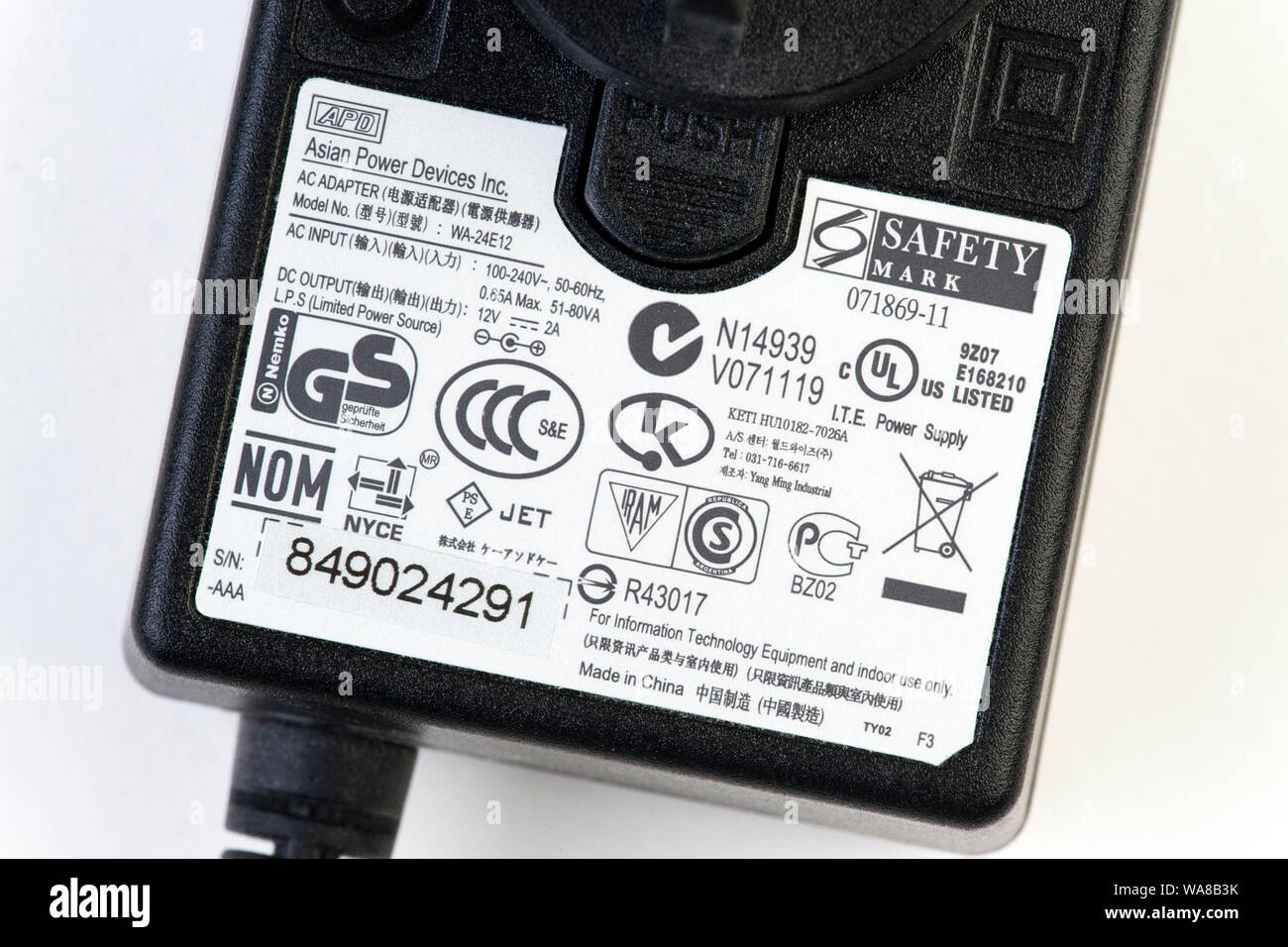 safety approvals label on electronic power supply adapter Stock Photo