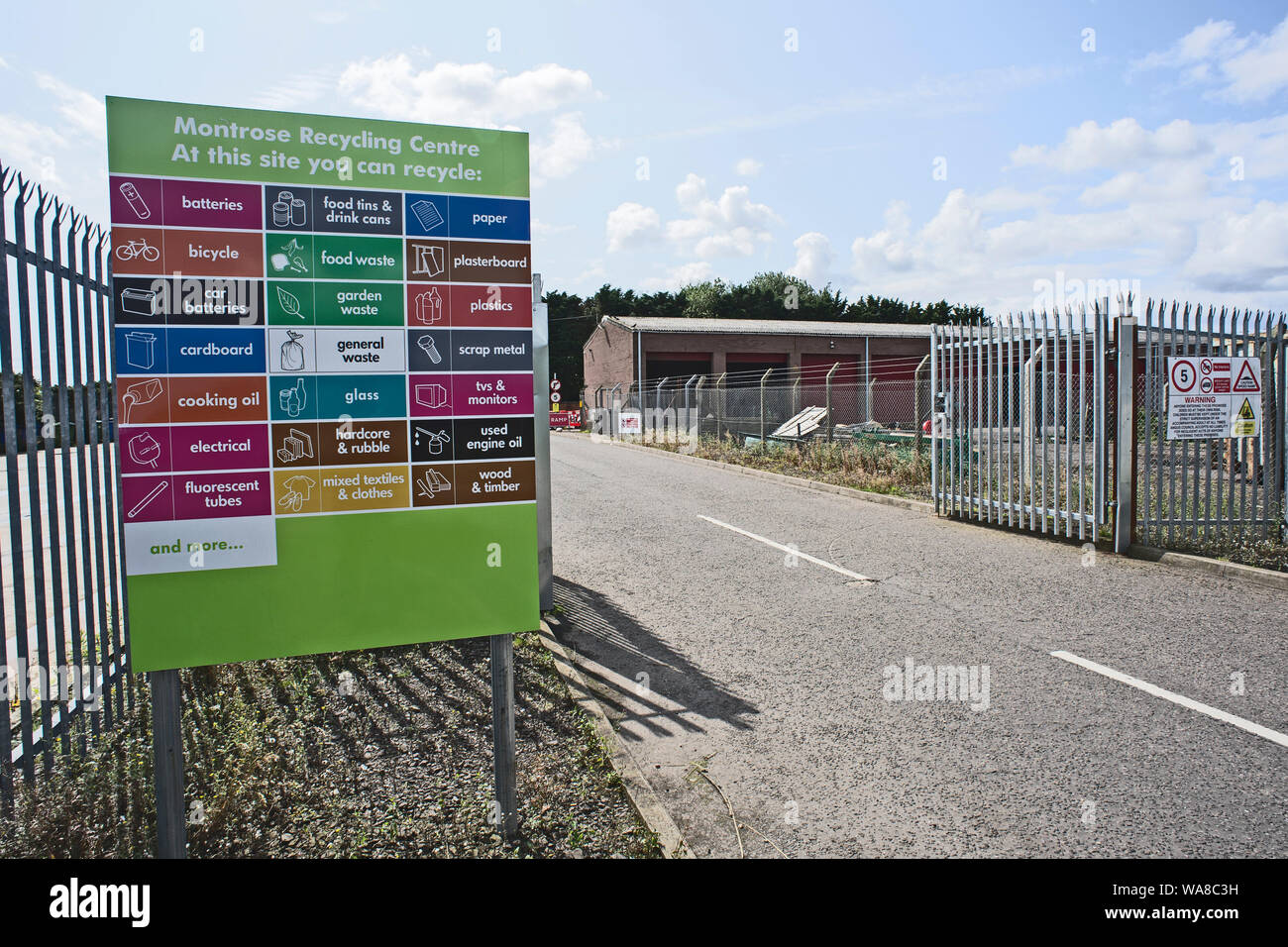 Entrance to Montrose Recycling Centre with information notice Stock Photo Alamy