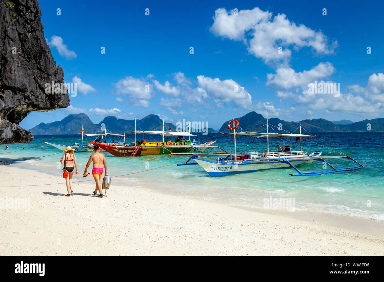 Traditional Wooden Banca Boats At Entalula Beach, El Nido, Palawan, The Philippines Stock Photo