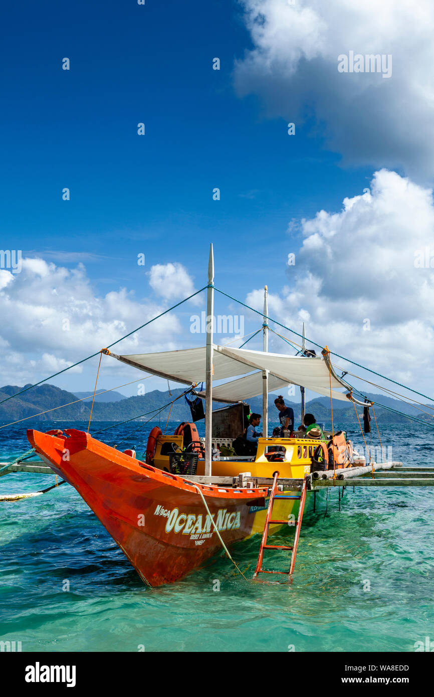 A Traditional Wooden Banca Boat At Entalula Beach, El Nido, Palawan, The Philippines Stock Photo