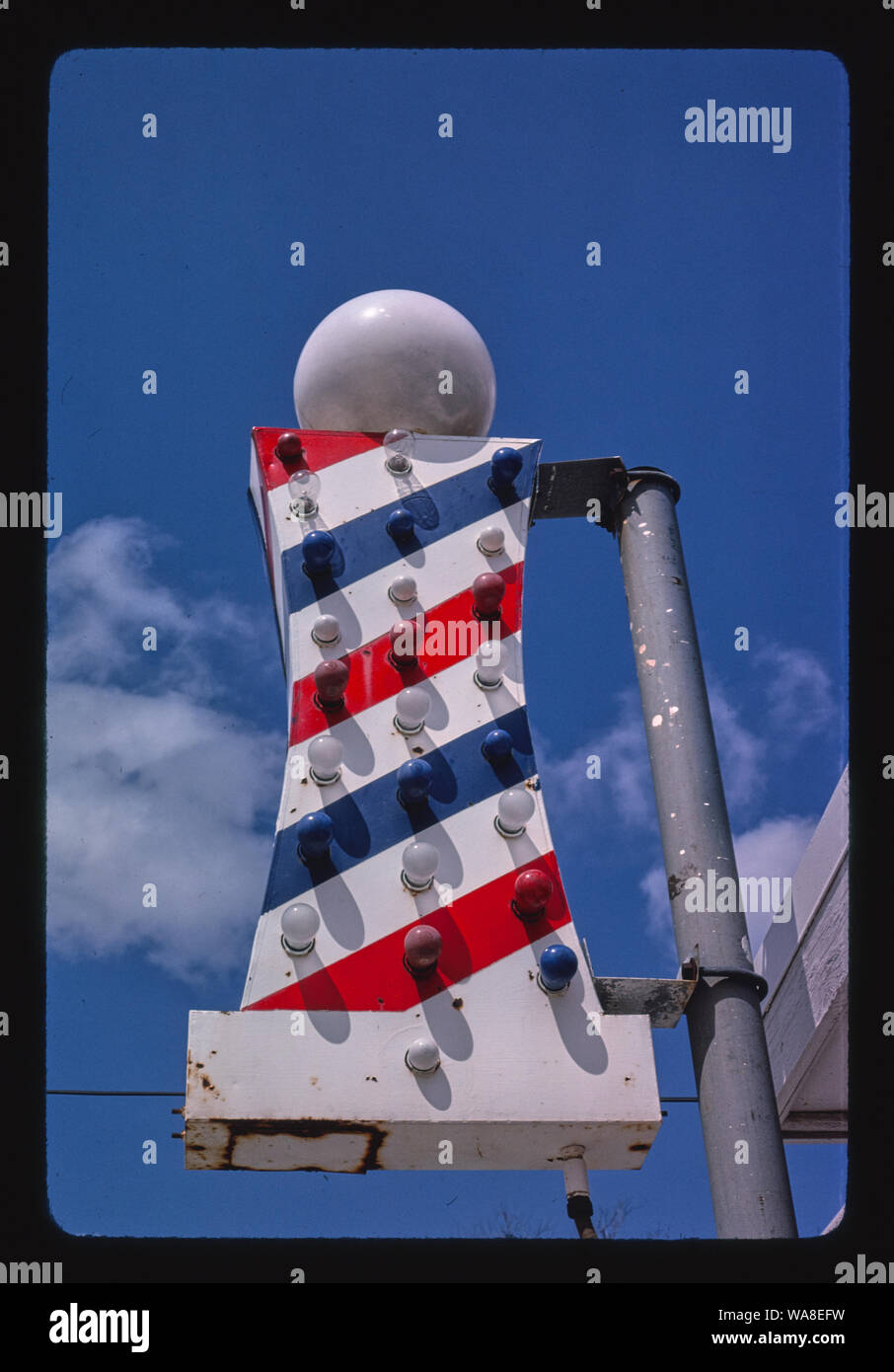 Cal Smith's Barber Shop pole, Main Street, Galesburg, Illinois Stock Photo