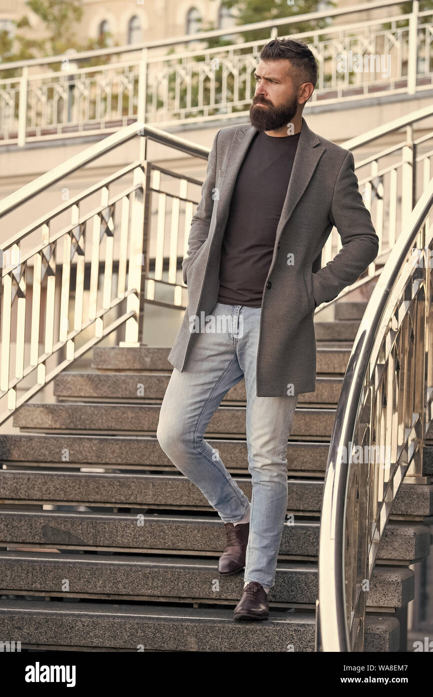 Down the stairs. Stylish casual outfit spring season. Menswear and male  fashion concept. Man bearded hipster stylish fashionable coat or jacket. Comfortable  outfit. Hipster fashion model outdoors Stock Photo - Alamy