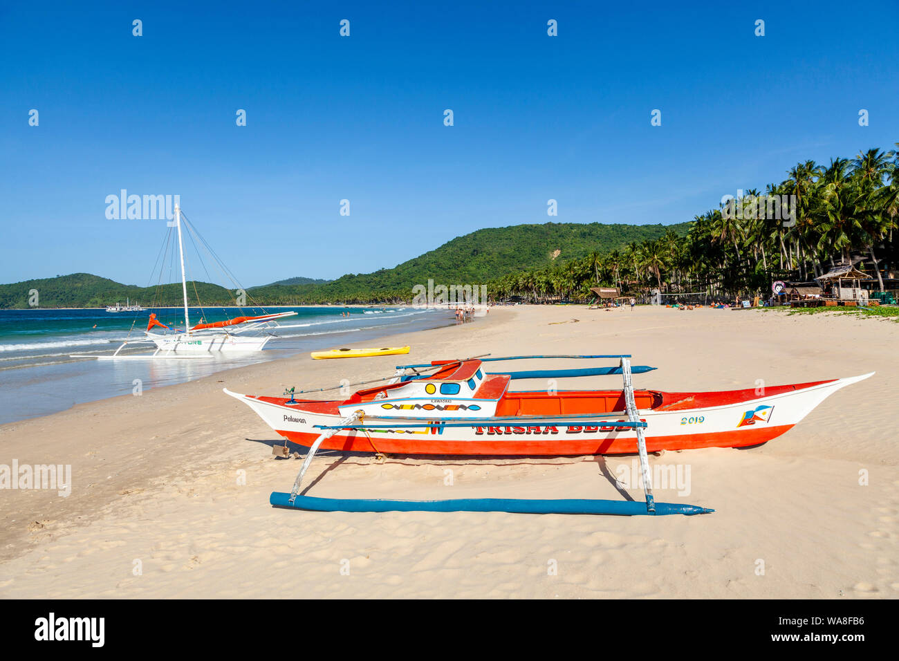 A Traditional Wooden Banca Boat, Nacpan Beach, El Nido, Palawan Island, The Philippines Stock Photo