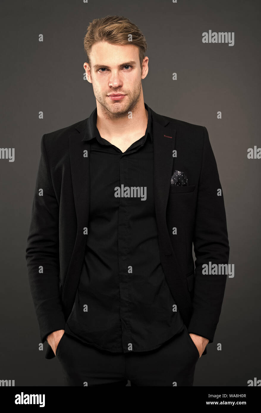 Black fashion trend. Man elegant manager wear black formal outfit on dark  background. Reasons black is the only color worth wearing. Elegance in  simplicity. Rules for wearing all black clothing Stock Photo -