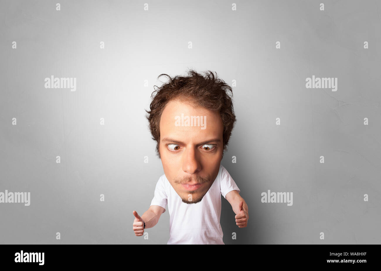 Big head on small body with copy space Stock Photo