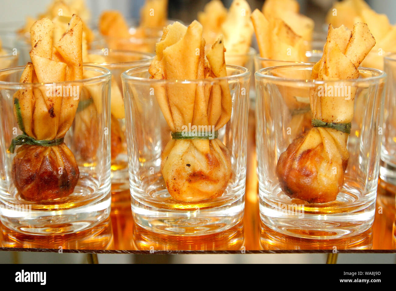 thai food toong tong , traditional appetisers in small glass on buffet line Stock Photo