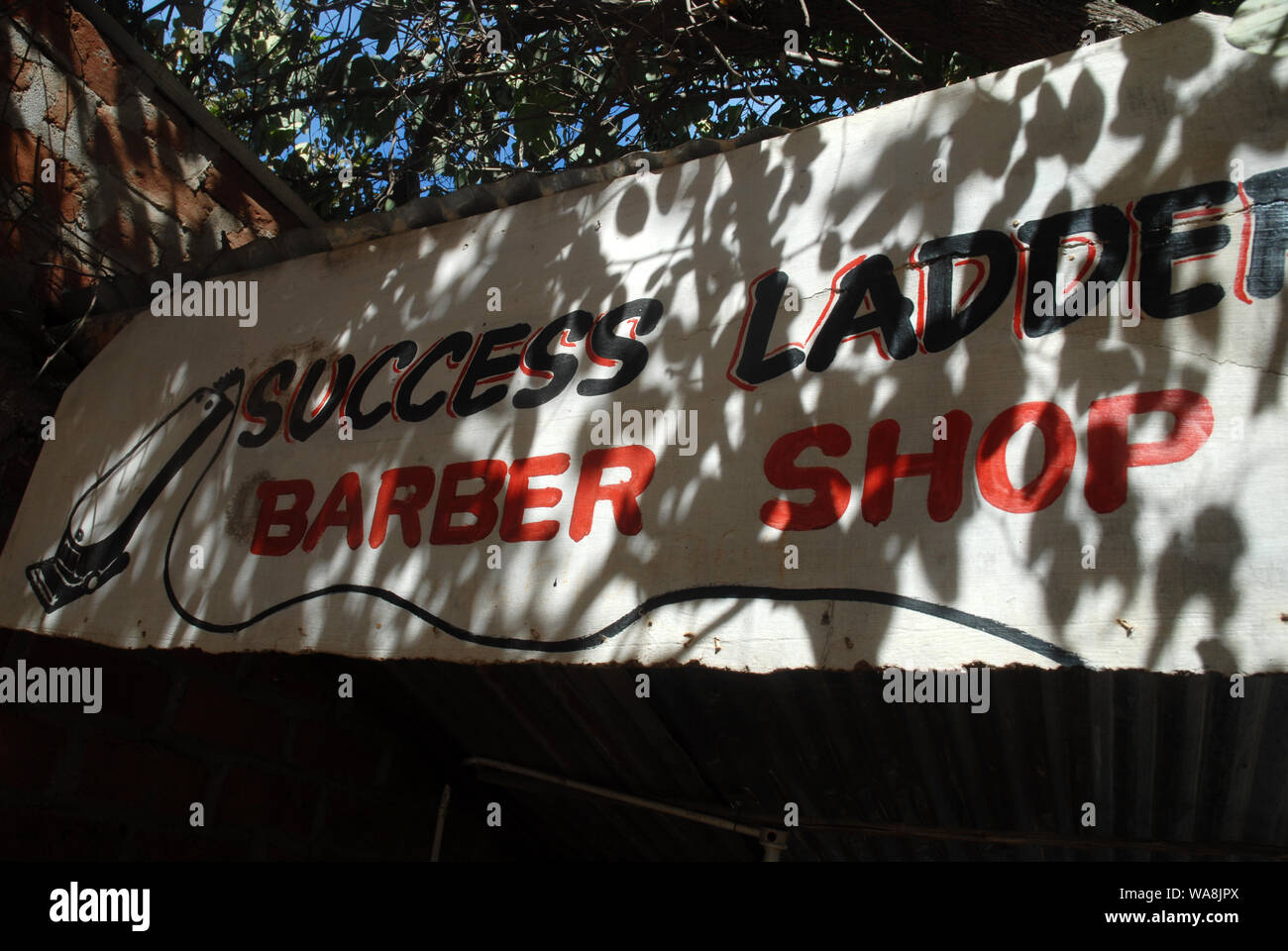 African barber shop sign hi-res stock photography and images - Alamy