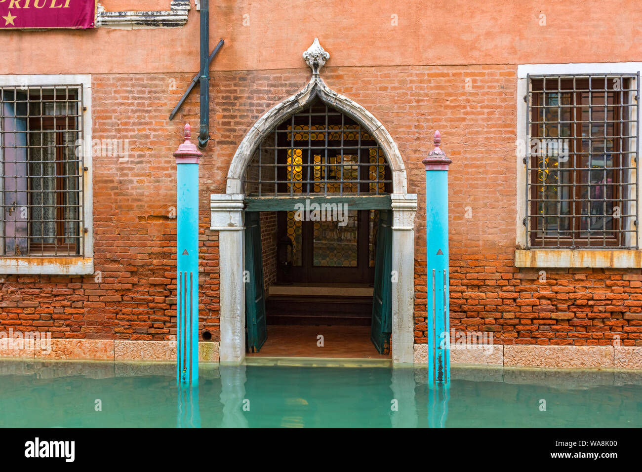 Doorway on the Hotel Palazzo Priuli over the Rio di San Provoio canal, Venice, Italy Stock Photo
