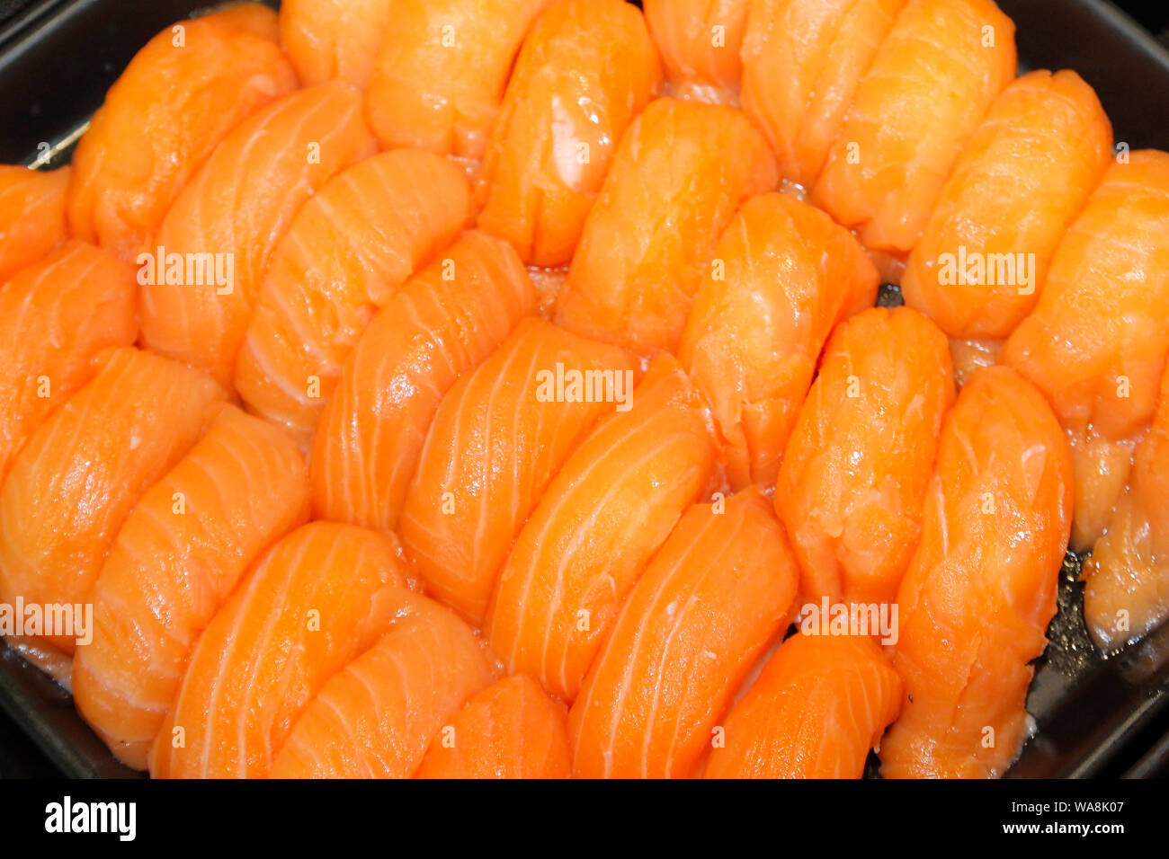 japanese food, close-up of sashimi salmon on buffet line Stock Photo