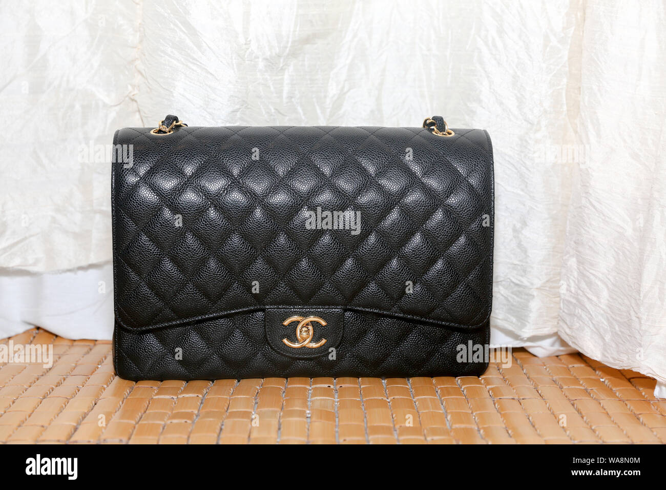 Princeton New Jersey, USA, August 18, 2019: Photo of black Chanel handbag  brand Editorial on white background Stock Photo - Alamy