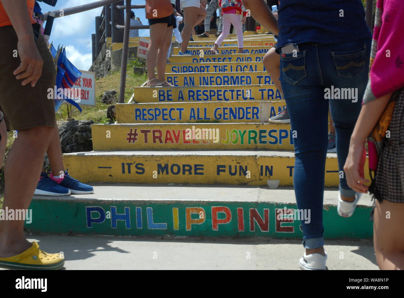 Walking up steps of look out at Chocolate Hills Complex, Carmen, Bohol
