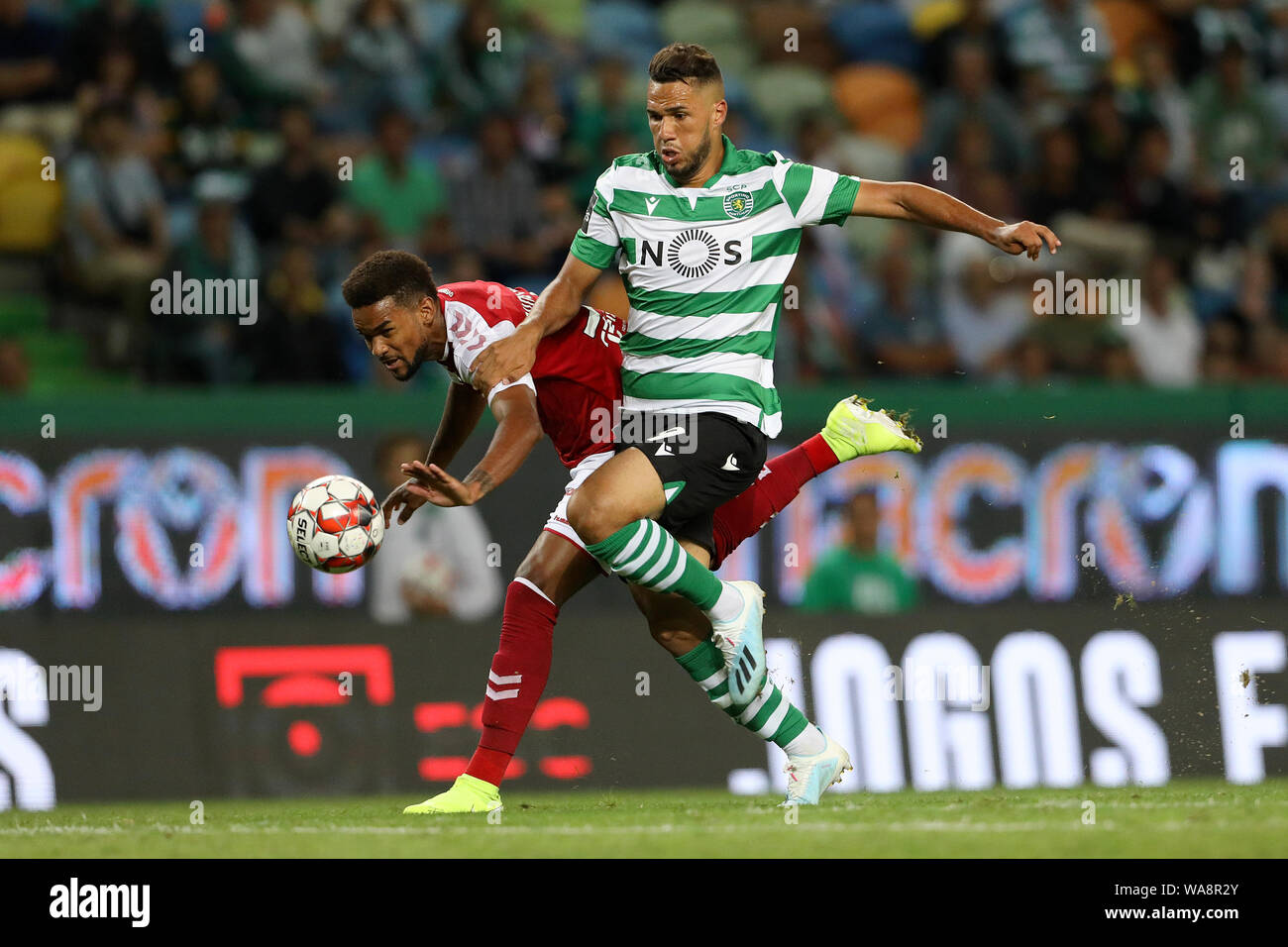 Bruno Viana of SC Braga (L) and Luiz Phellype of Sporting CP(R) are seen in  action during the League NOS 2019/20 football match between Sporting CP and SC  Braga in Lisbon.(Final score;