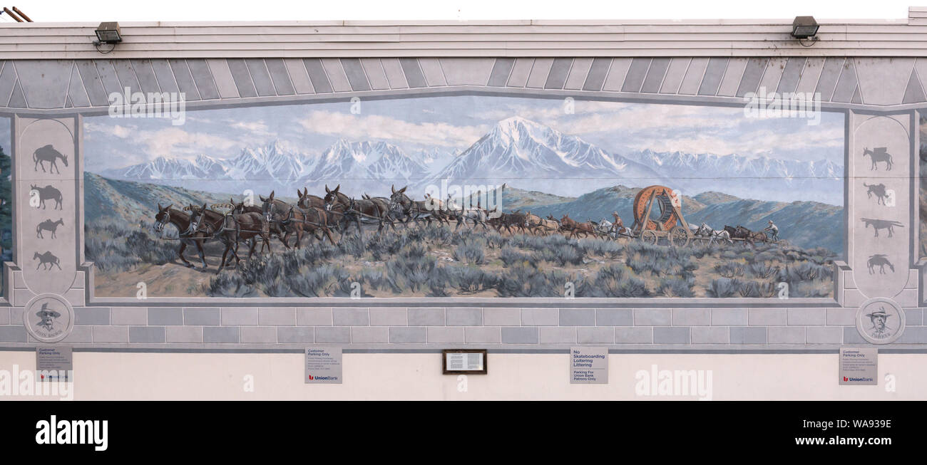 Central panel of The Ernest Kinney Teamster Family Mural by Robert Thomas, John Knowlton Jenna Morgenstein, Rich Perkins, Tory Michener and J.T. Schmidt, 1999. Located in Bishop, a small town in Inyo County, California, at the northern end of the sweeping Owens Valley in the Eastern Sierra Mountains Stock Photo