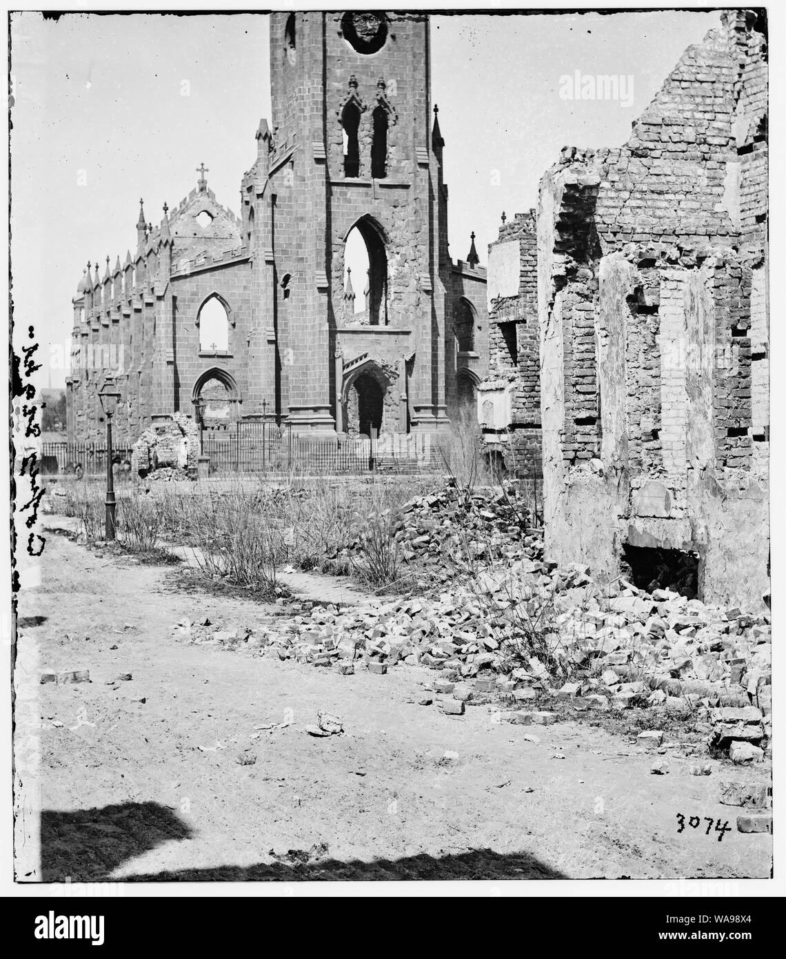 Charleston, South Carolina. Roman Catholic Cathedral of St. John and St. Finbar (Broad and Legare Streets) destroyed in the fire of December 1861. (front view) Stock Photo
