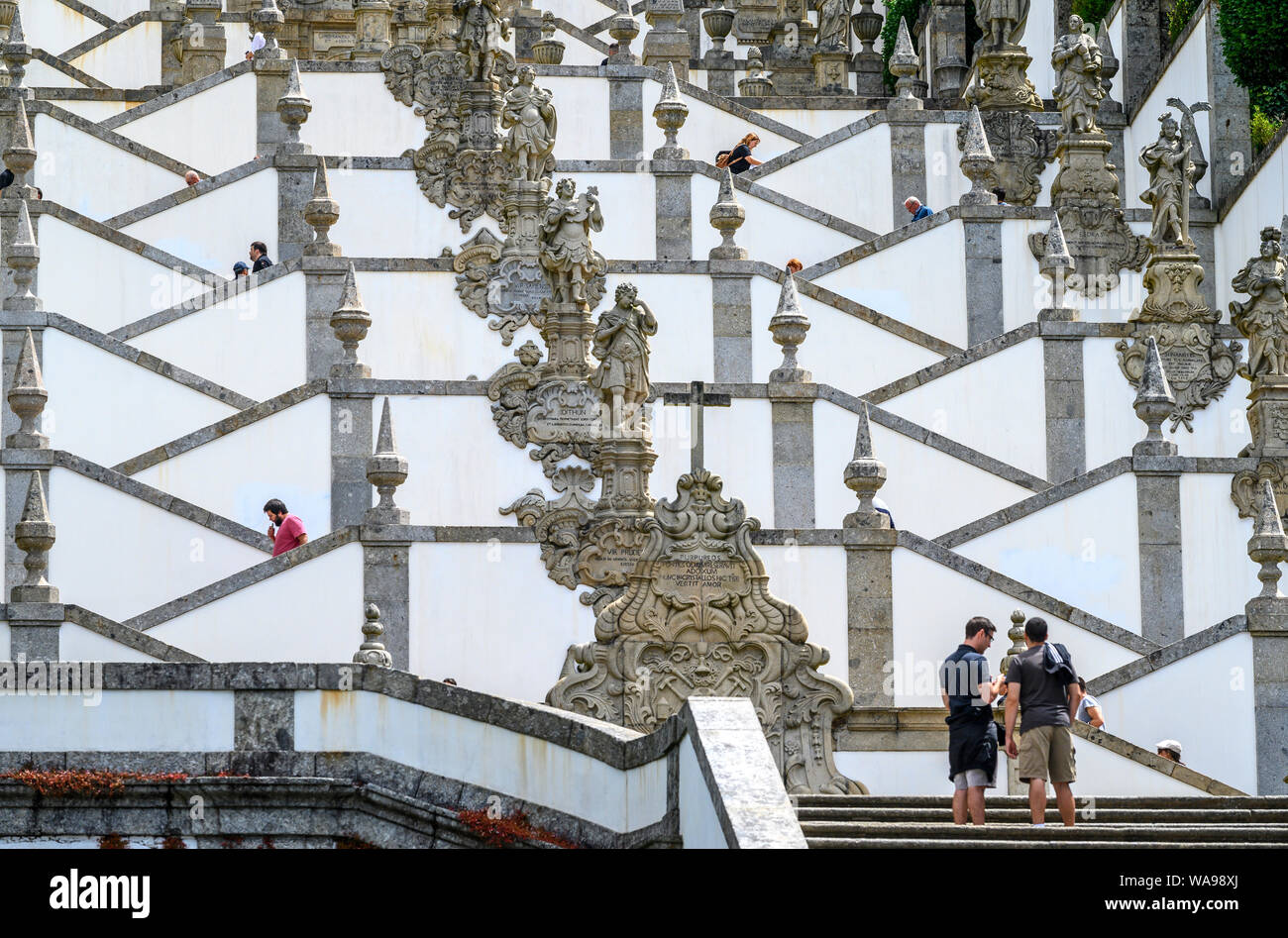 The 18th century, Baroque stairway at the Santuary and pilgrimage site  of Bom Jesus do Monte at Tenoes on the outskirts of the city of  Braga in Nort Stock Photo