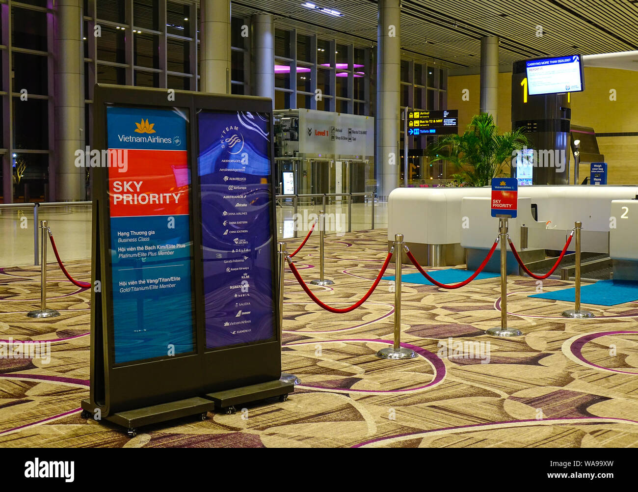 Singapore - Mar 28, 2019. Check-in Counters of Vietnam Airlines at Terminal 4 of Changi Airport (SIN). Terminal 4 officially opened on October 2017. Stock Photo