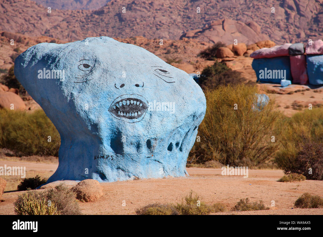 Blue and red rocks in the middle of the dry Atlas mountains in Morocco. Stock Photo