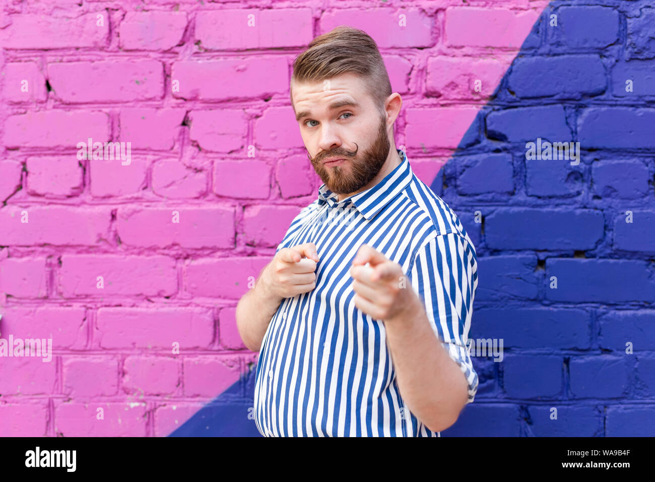 Funny Young Stylish Guy With A Mustache And A Beard In A Stylish