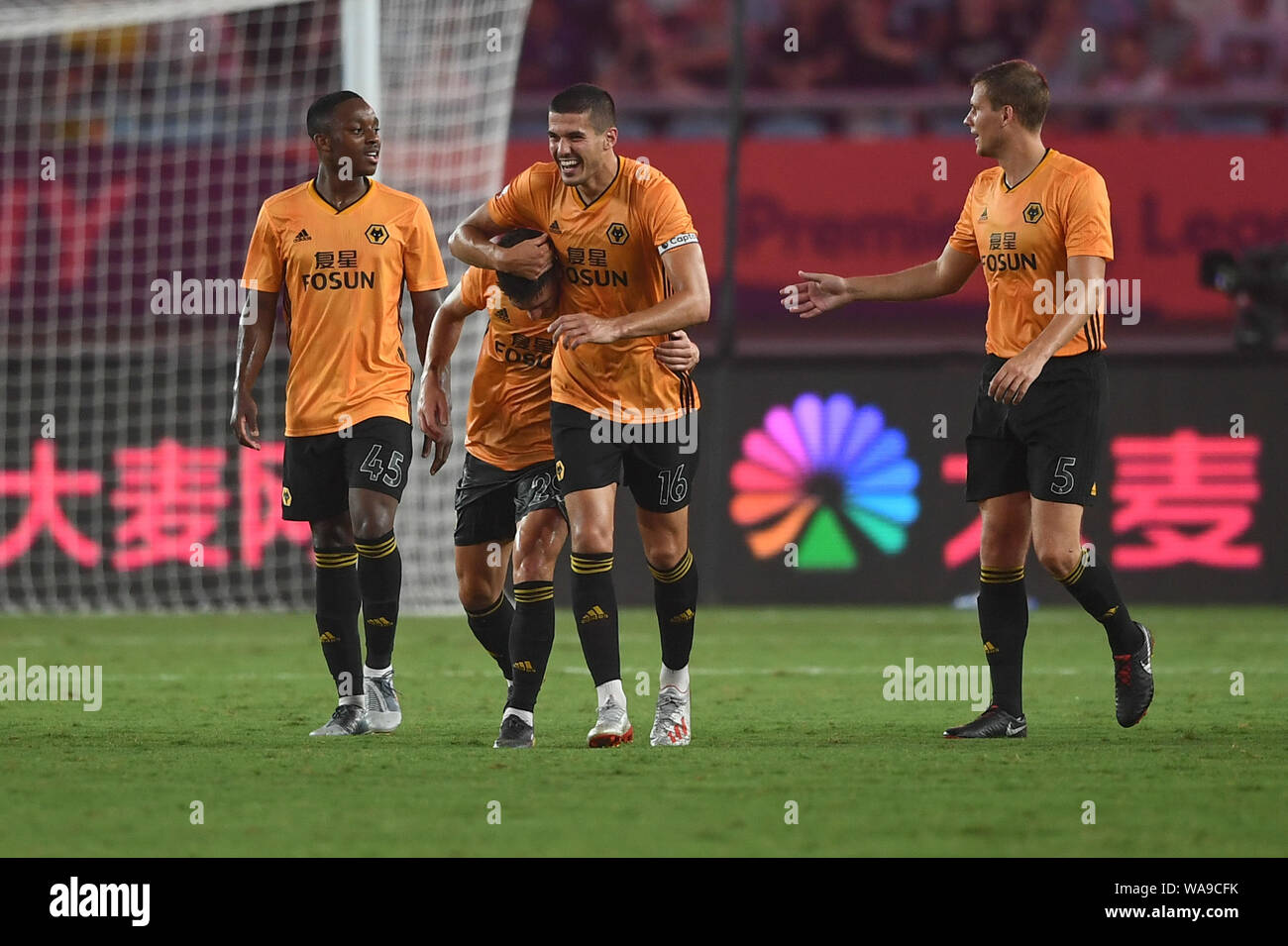 Portuguese football player Ruben Vinagre, center, of Wolverhampton  Wanderers F.C. of English League champions celebrates with Conor Coady  after scorin Stock Photo - Alamy