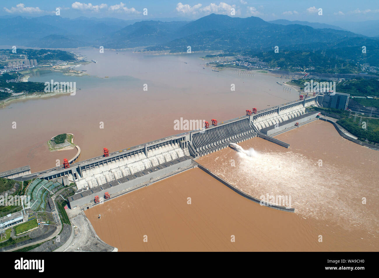 Panoramic view of the Three Gorges Dam releasing water for flood control on the Yangtze River in Zigui county, Yichang city, central China's Hubei pro Stock Photo