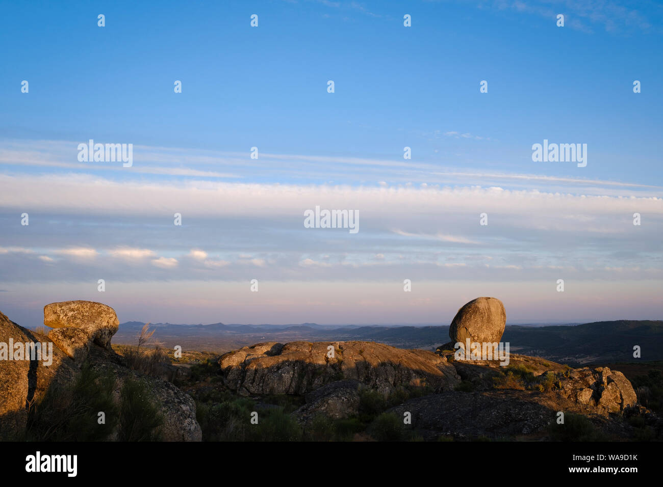 Round granite boulders at sunset. Cáceres province. Extremadura. Spain. Stock Photo