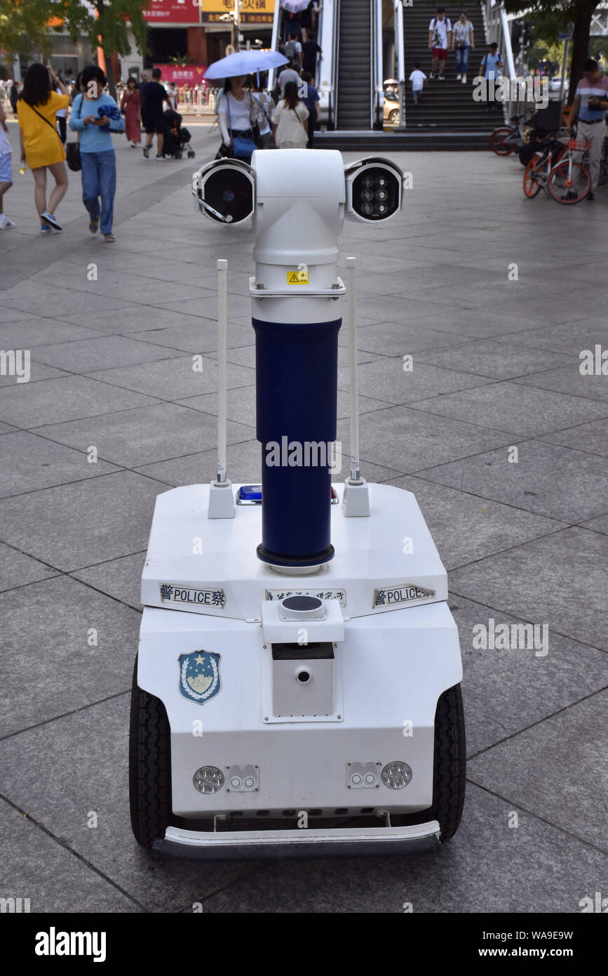 The Robot Resembling Wall E In The Movie Patrolling In The Streets Of Beijing China 25 July 19 The Robot Serves For Beijing Policeman By Patrol Stock Photo Alamy The Robot Resembling Wall E In The Movie Patrolling In The Streets Of Beijing China 25 July 19 The Robot Serves For Beijing Policeman By Patrol Stock Photo Alamy
