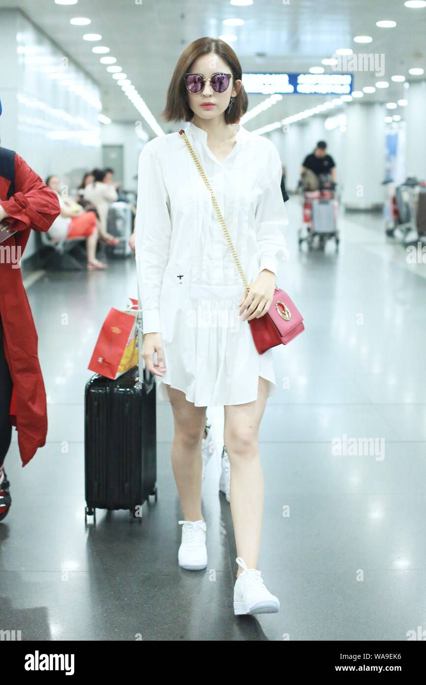Chinese Uigur actress Gulnezer Bextiyar, also known as Gulnazar or Guli Nazha (Gulinazha), arrives at the Beijing Capital International Airport before Stock Photo