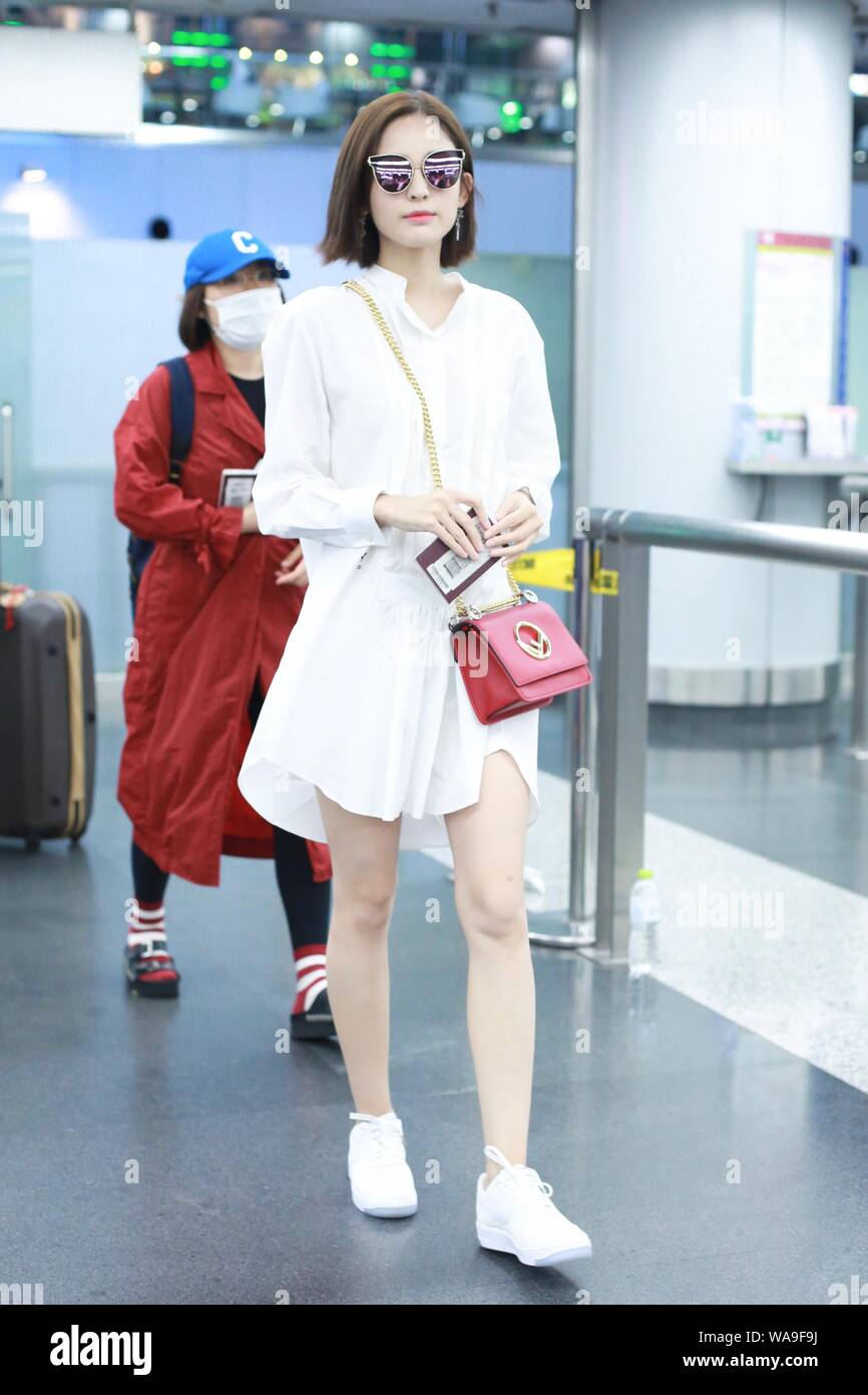 Chinese Uigur actress Gulnezer Bextiyar, also known as Gulnazar or Guli Nazha (Gulinazha), arrives at the Beijing Capital International Airport before Stock Photo