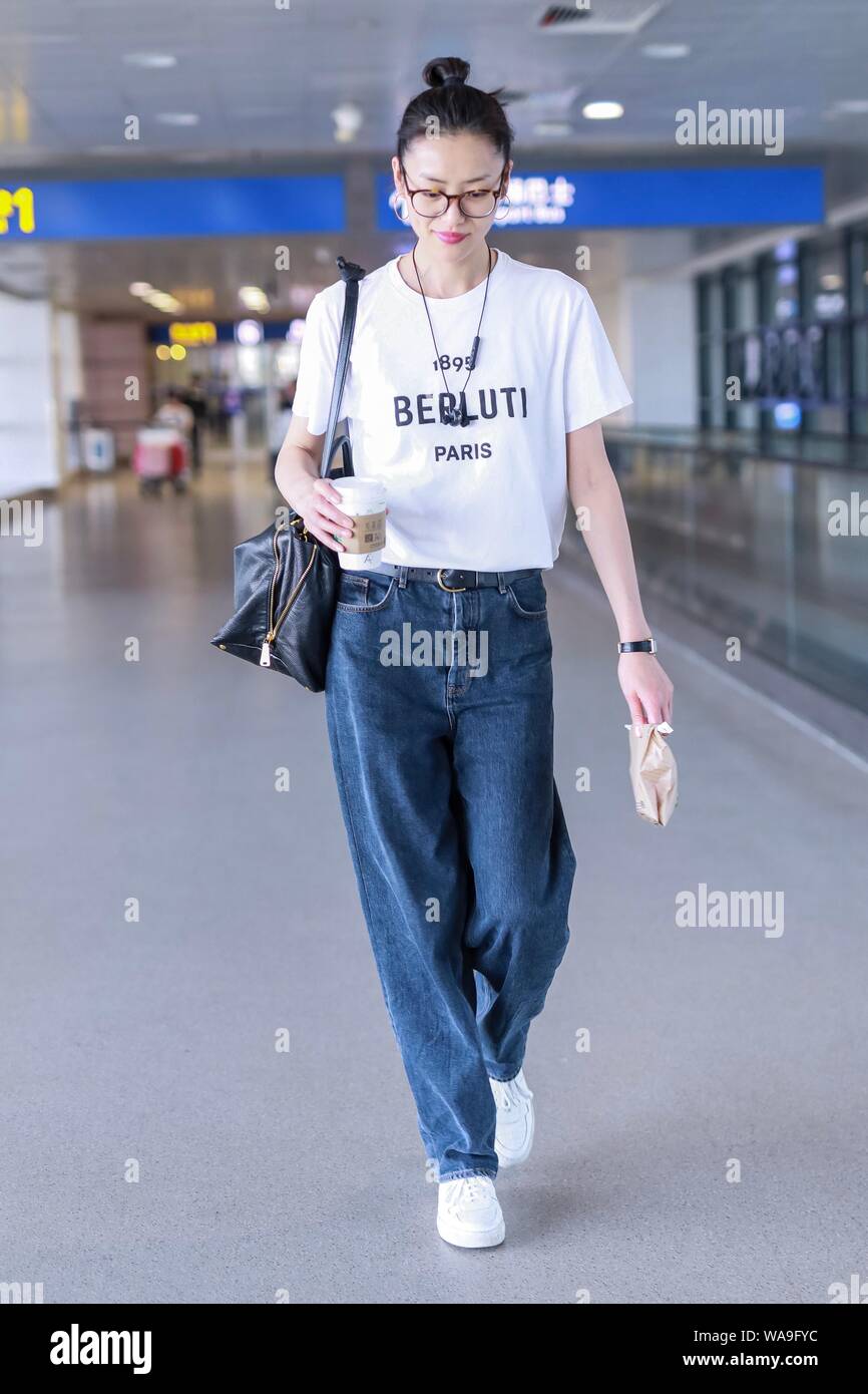 Chinese model Liu Wen arrives at the Shanghai Pudong International ...