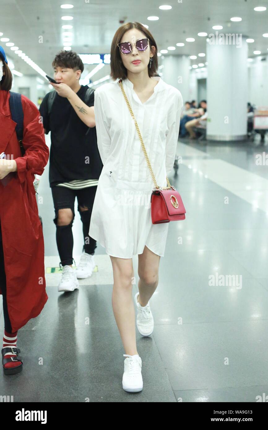 Chinese Uigur actress Gulnezer Bextiyar, also known as Gulnazar or Guli Nazha (Gulinazha), arrives at the Beijing Capital International Airport before Stock Photo