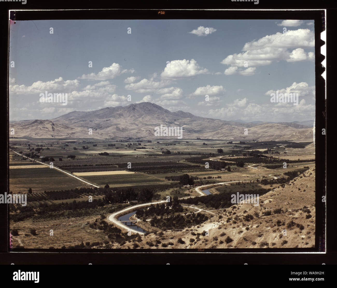 Cherry orchards, farm lands and irrigation ditch at Emmett, Idaho Stock