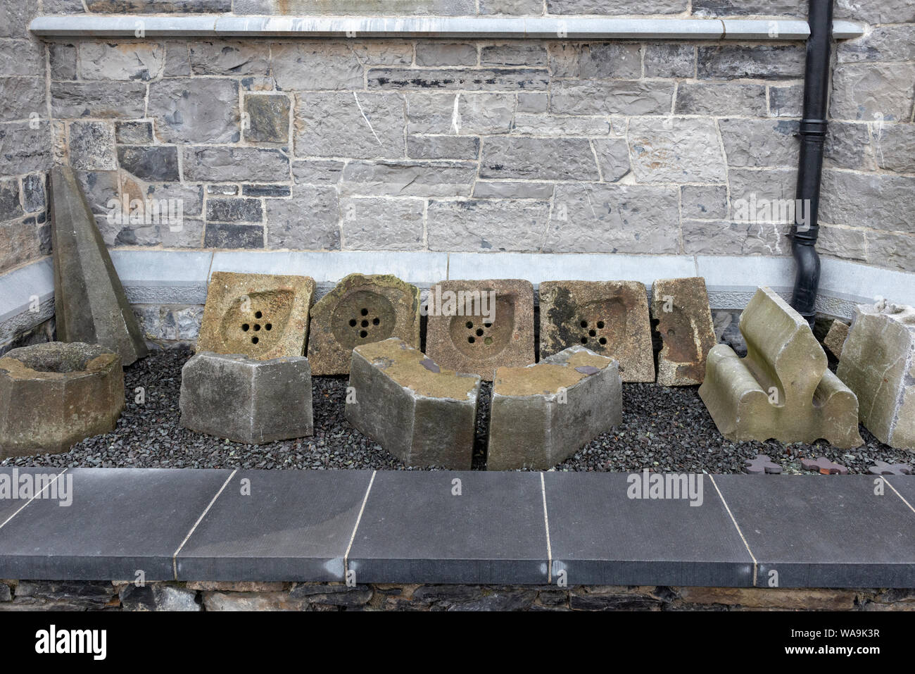 The St. James Church original old spire in pieces at the Pearse Lyons Distillery backyard and graveyard in Dublin, Ireland Stock Photo